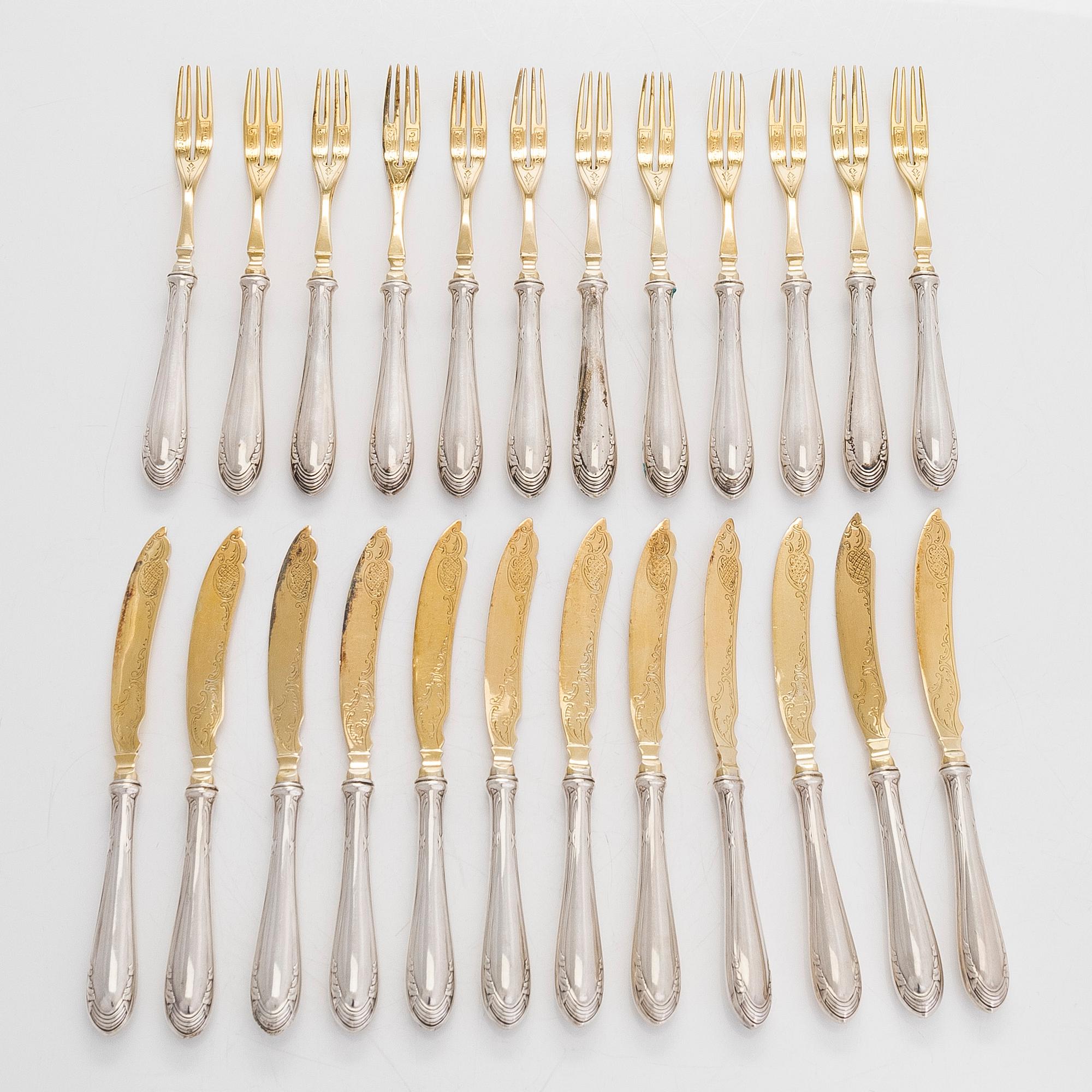 A 12-piece set of parcel-gilt fruit cutlery, and a silver butter knife, maker's mark Iisakki Saha, Pori 1898-1899.