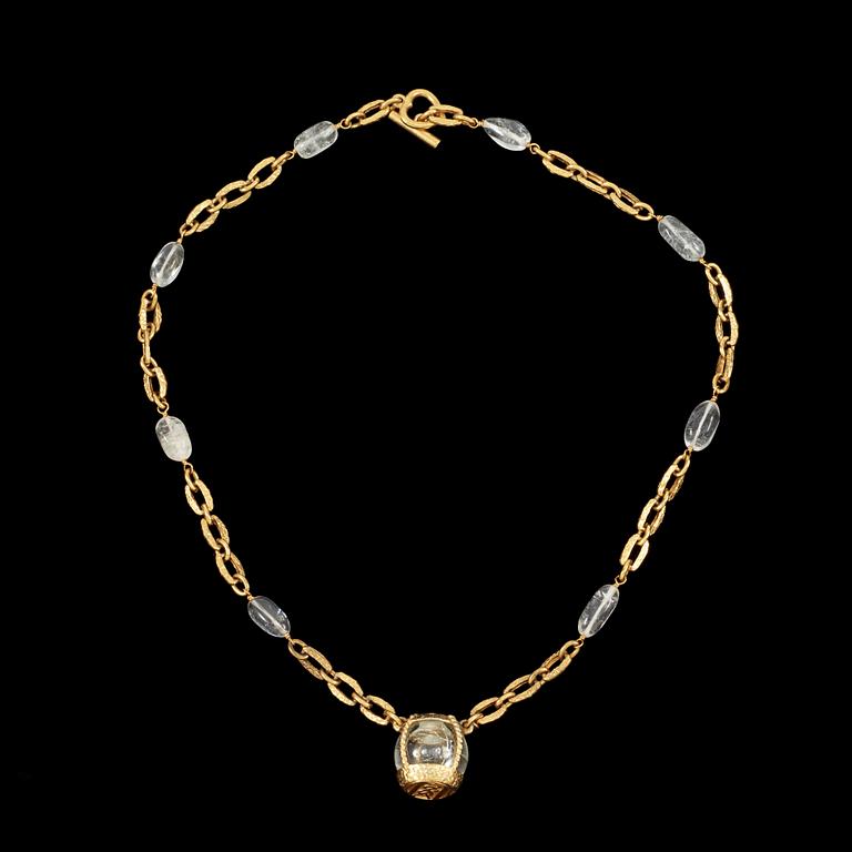 A necklace by Yves Saint Laurent.