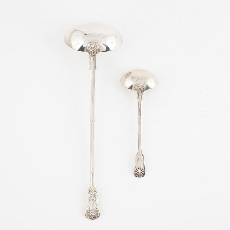 Two Swedish 19th century soup ladles, the small in silver, mark of Gustaf Möllenborg and the large in silver plate.