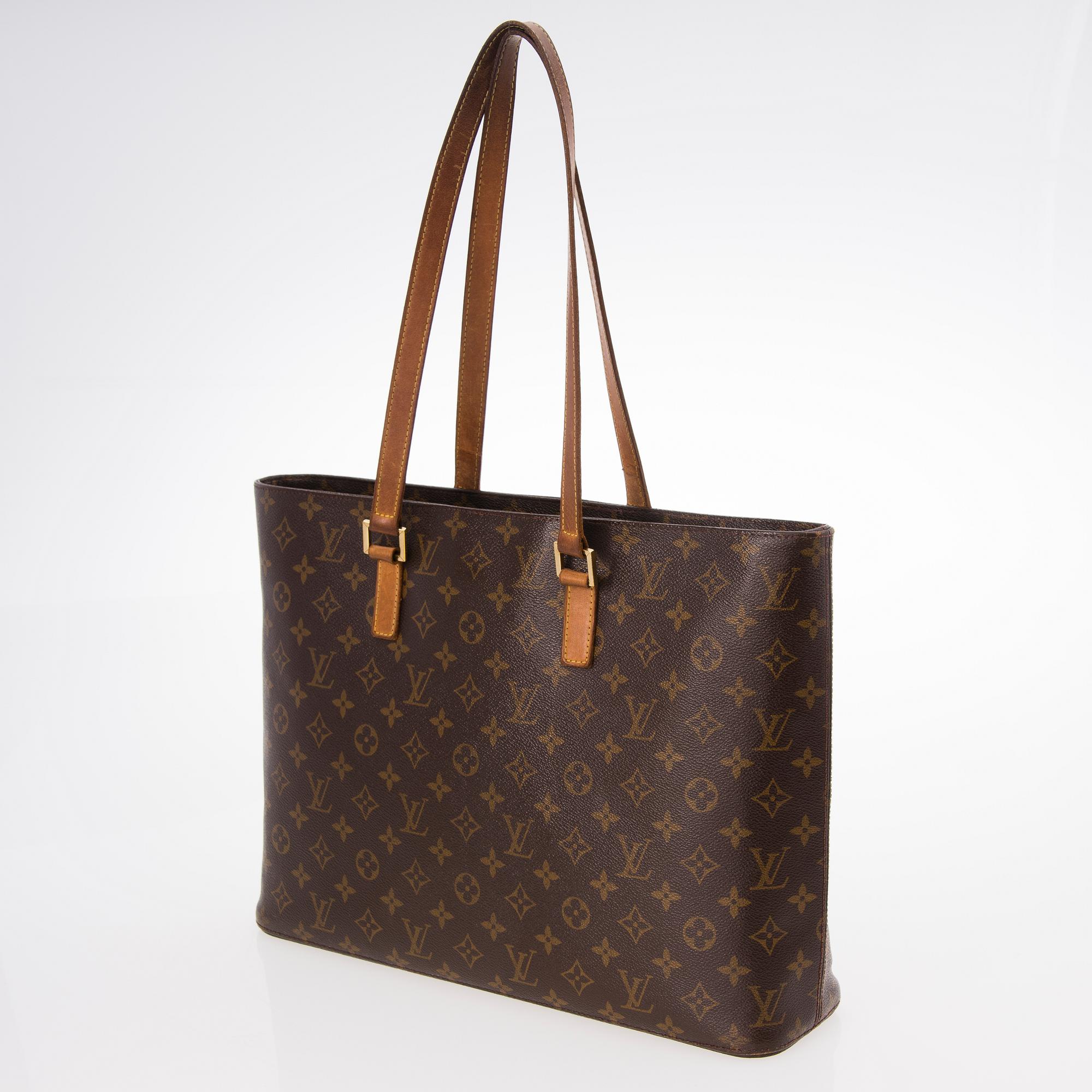 LOUIS VUITTON, A Monogram Luco Tote Bag.