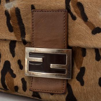FENDI, a pony hair handbag.