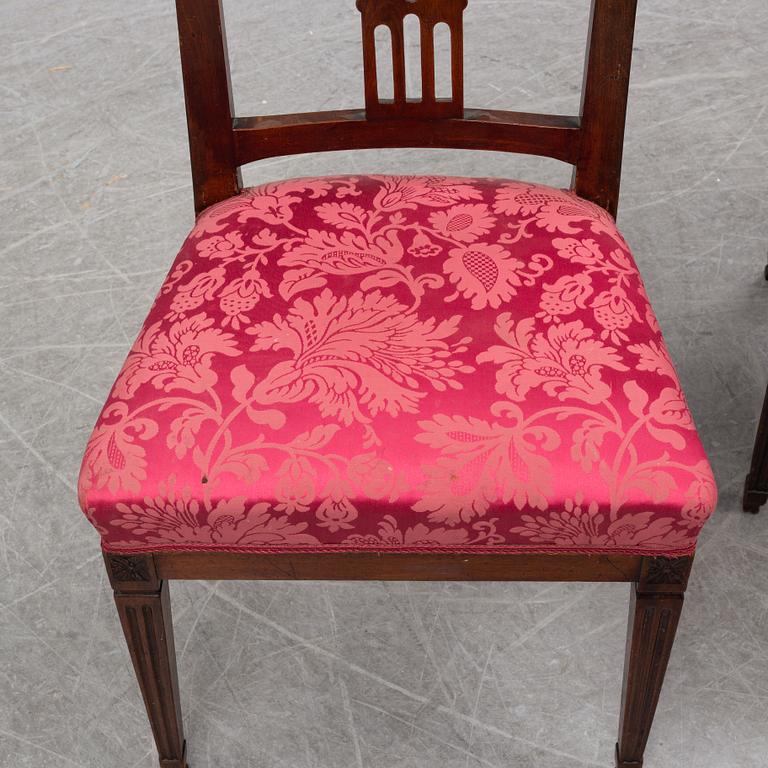 A pair of early 19th century mahogany chairs.