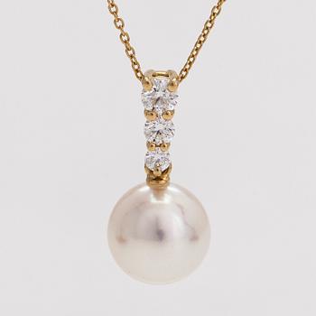 An 18K gold necklace with a cultured pearl pendant and diamonds totalling approx. 0.15 ct.