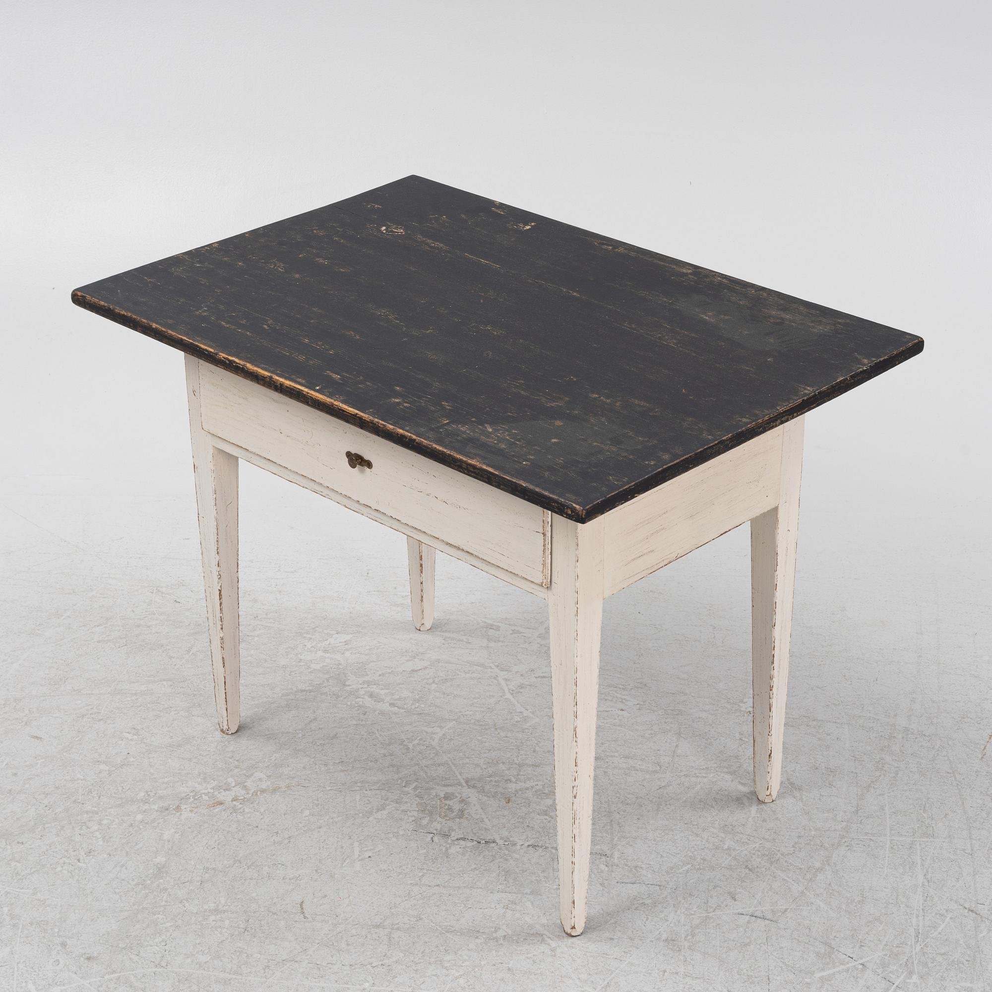 A painted table, 19th Century.