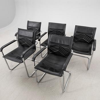 A set of five chrome and leather armchairs alter part of the 20th century.