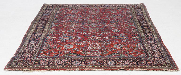 A Kashan rug, c. 208 x 138 cm.