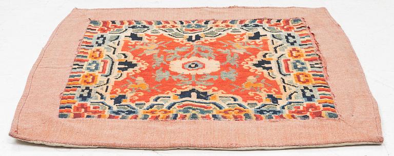 A antique Tibetian meditation rug, c 84 x 80 cm.