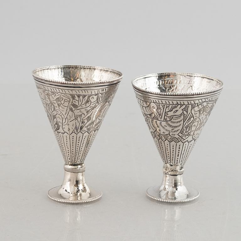A silver 800 tray and coffee pot, and six glasses without marks. Probably Egypt.
