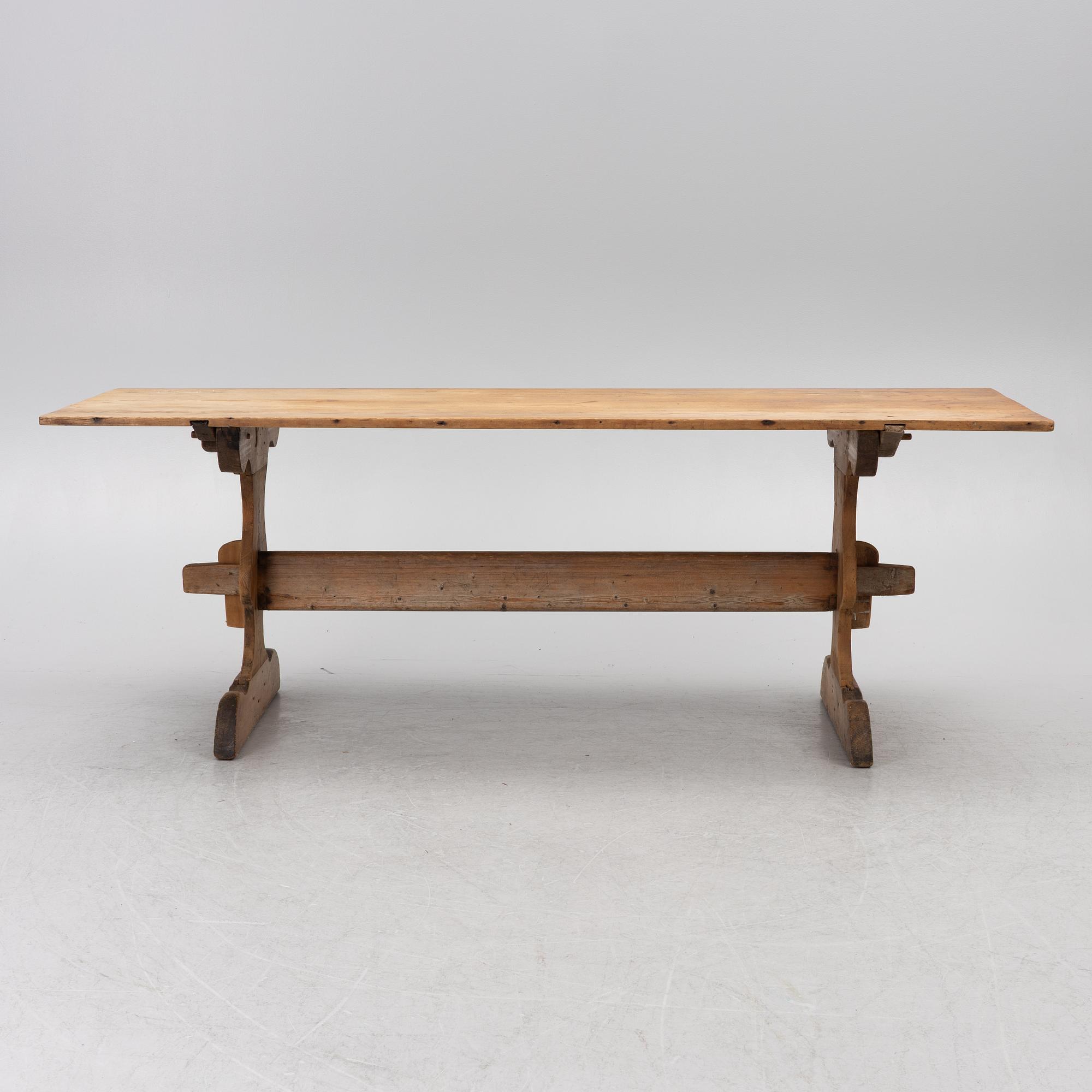 A Swedish pine trestle table, 18th / 19th century.