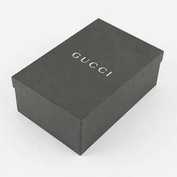 Gucci, a pair of wedge heel shoes, Italian size 36.