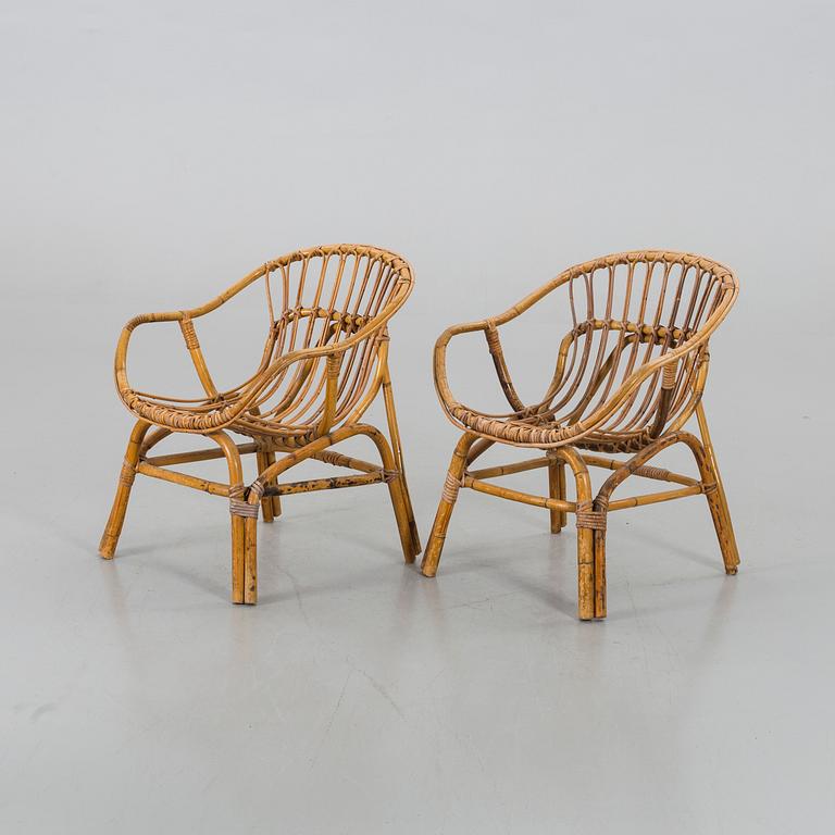 A PAIR OF RATTAN ARMCHAIRS.