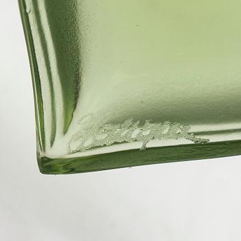 A Lalique heart pendant with an 18K gold chain.