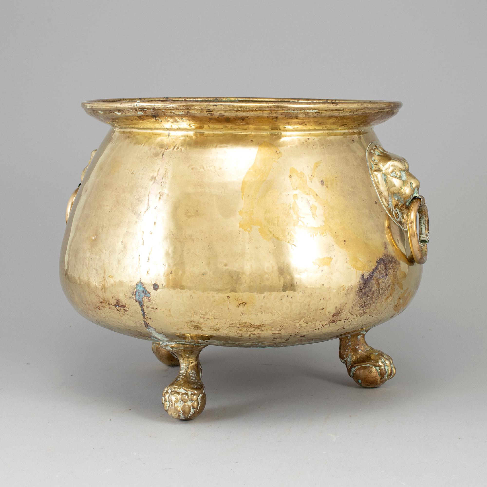 A 19th century brass flower pot.