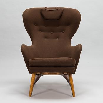 Carl Gustaf Hiort af Ornäs, A mid-20th-century armchair 'Siesta' manufacturer Puunveisto Oy - Träsnideri Ab, Finland.