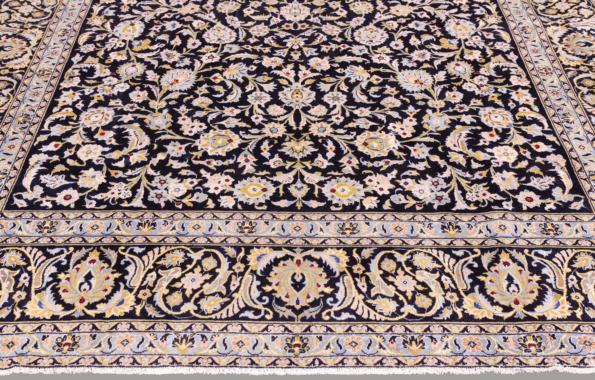 A carpet, Kashan, signed, ca 410 x 292 cm.
