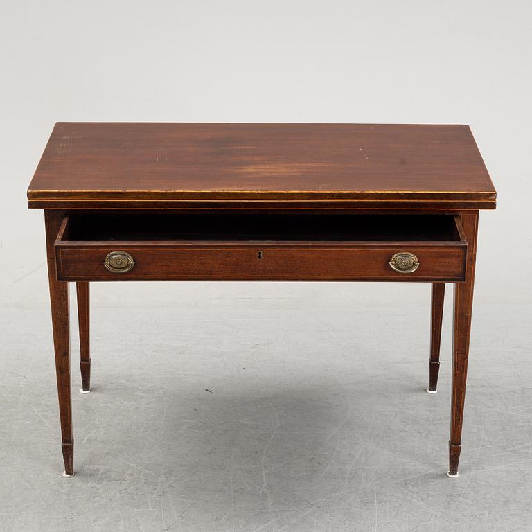 A mid 19th Century mahogany card table.
