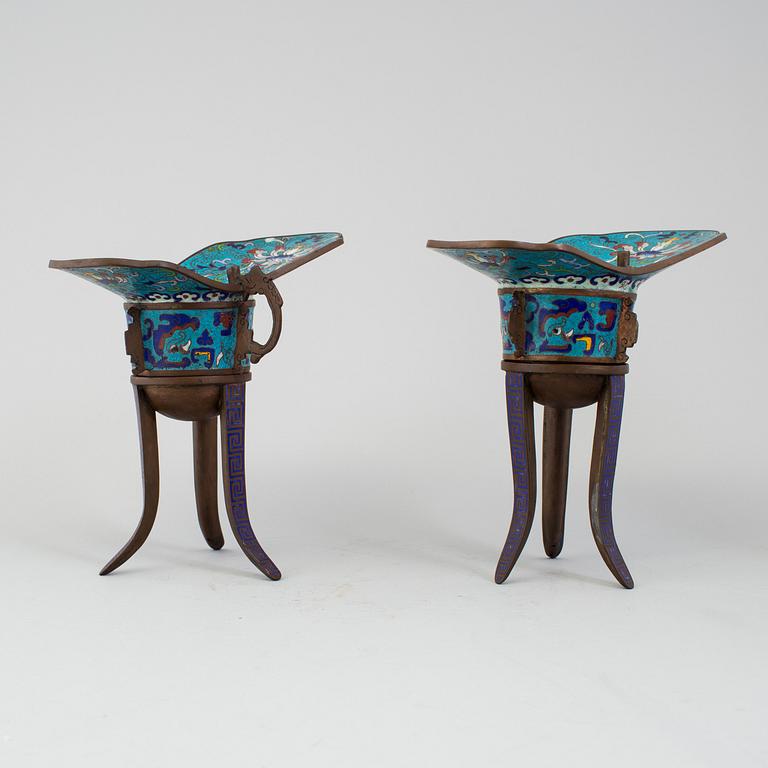 A pair of chinese cloisonné tripod wine vessels, 20th century.