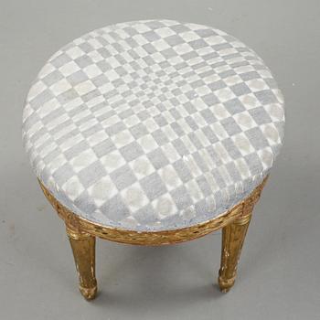 A gilded gustavian stool by E Levin.
