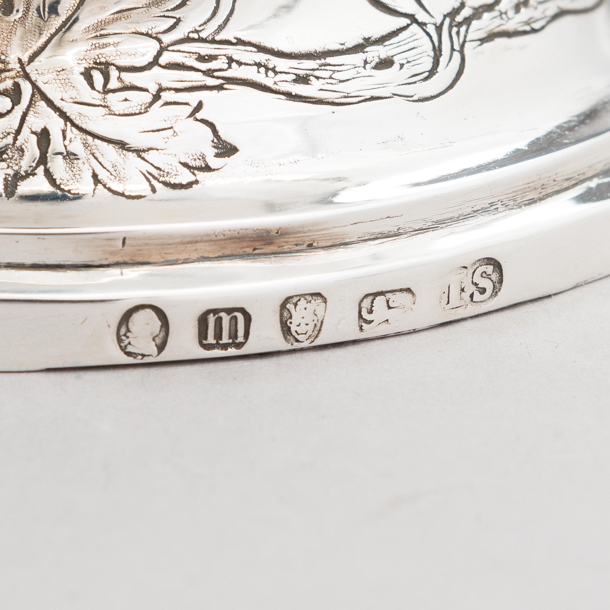 A George III sterling silver ewer by John Scofield, London, 1787.