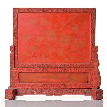 A red lacquer screen, Qing dynasty, 19th Century.