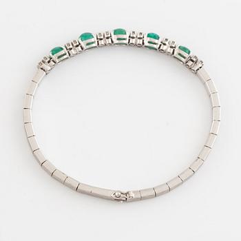 Bracelet, white gold with cabochon-cut emeralds and brilliant-cut diamonds.