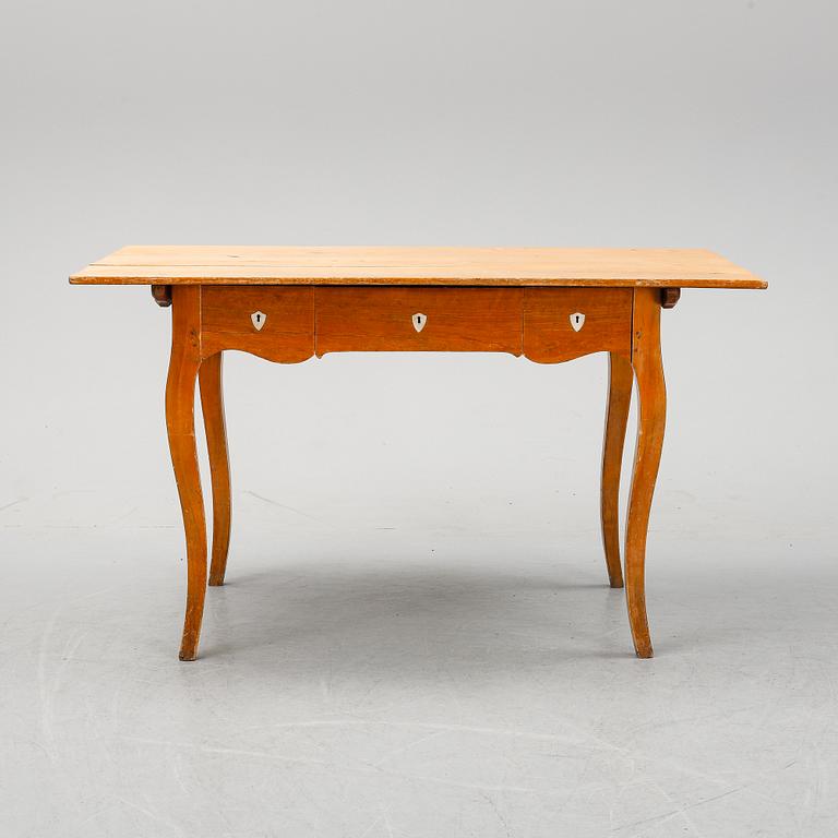 A birch Rococo style desk, second half of the 19th Century.