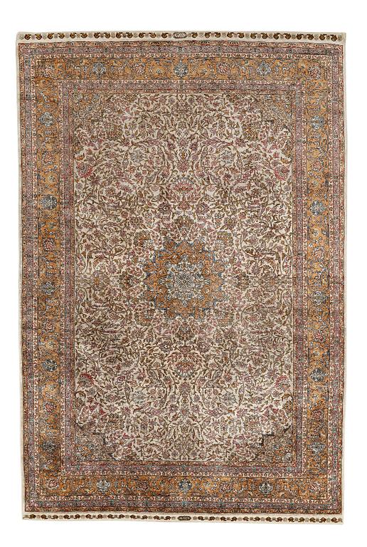 A carpet, an old silk Turkey, ca 237,5 x 146,5  cm (as well as 3,5-4 cm flat weave at the ends).