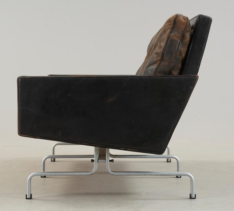 A Poul Kjaerholm 'PK-31-2' steel and black leather sofa,E Kold Christensen, Denmark.