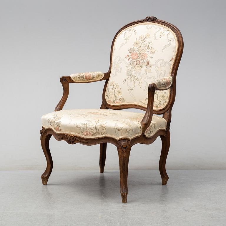 A mid 18th century Rococo arm chair.