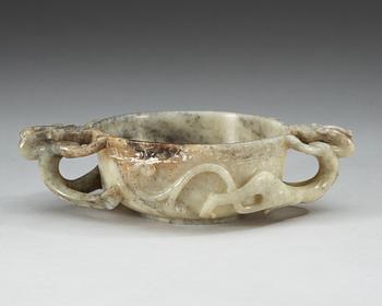 A carved nephrite ceremonial wine cup, late Qing dynasty.