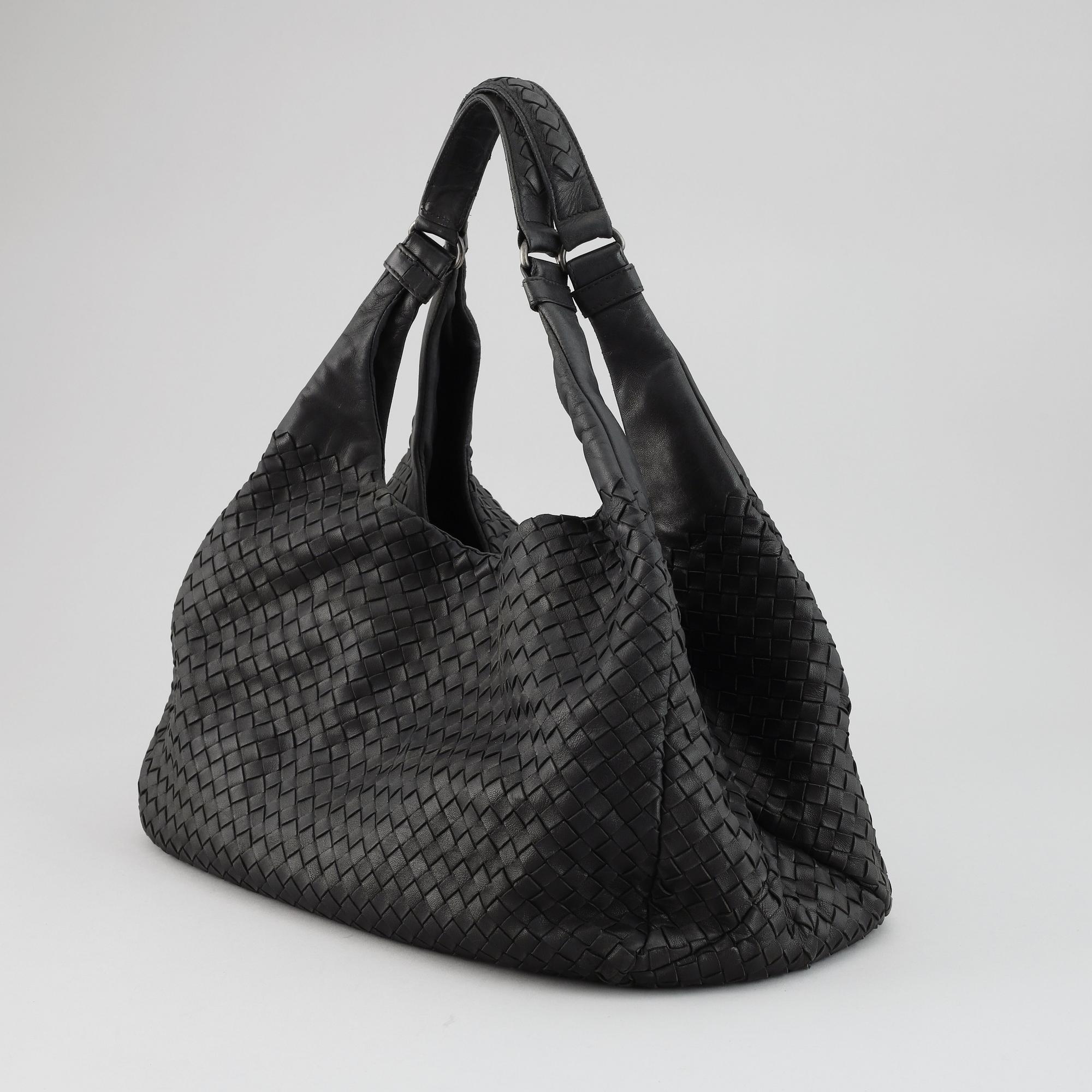 BOTTEGA VENETA, black leather bag.