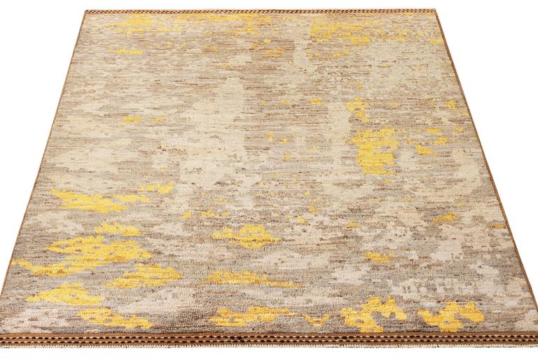 An Ushak Design carpet, a. 291 x 202 cm.