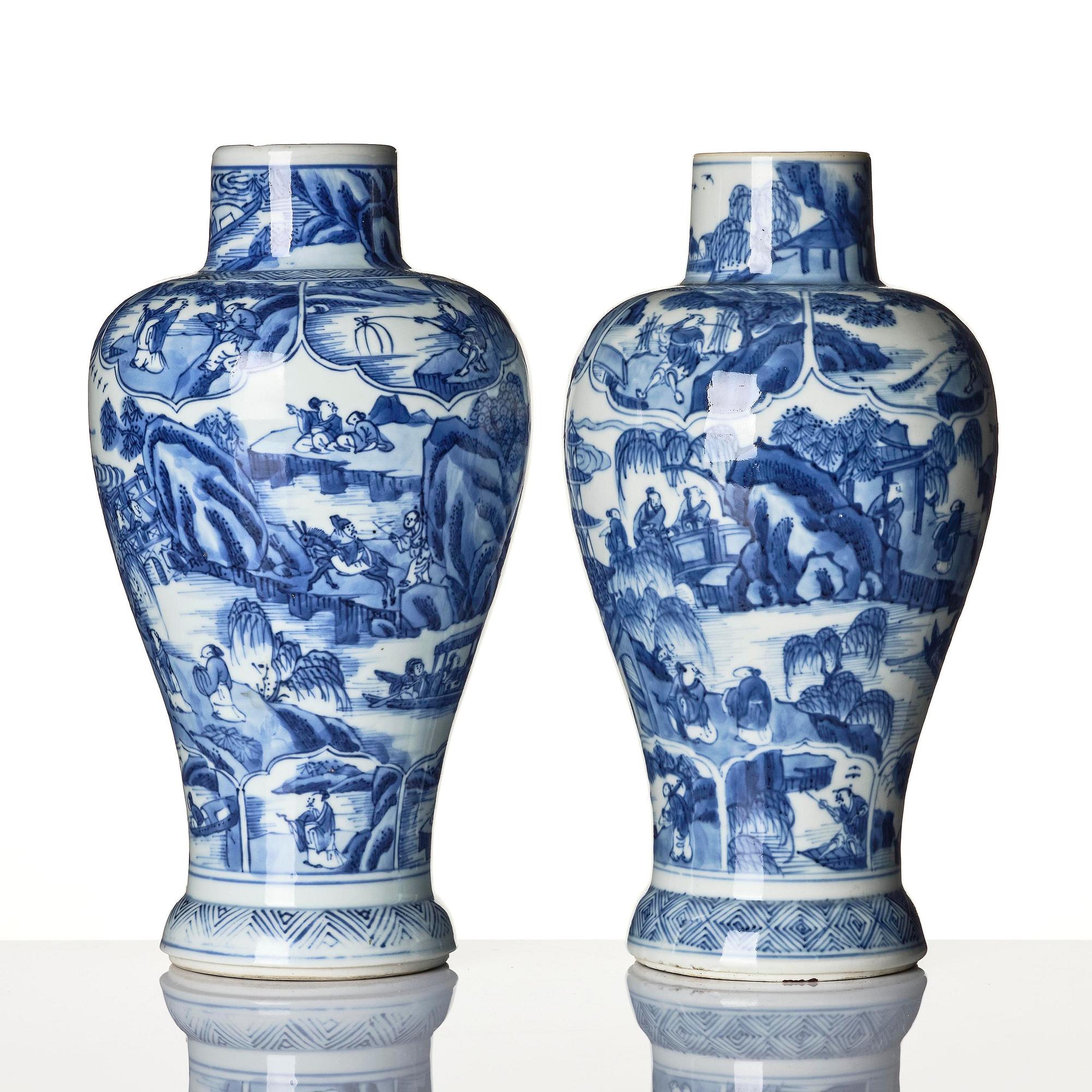 A pair of blue and white 'landscape' vases, Qing dynasty, Kangxi (1662-1722).