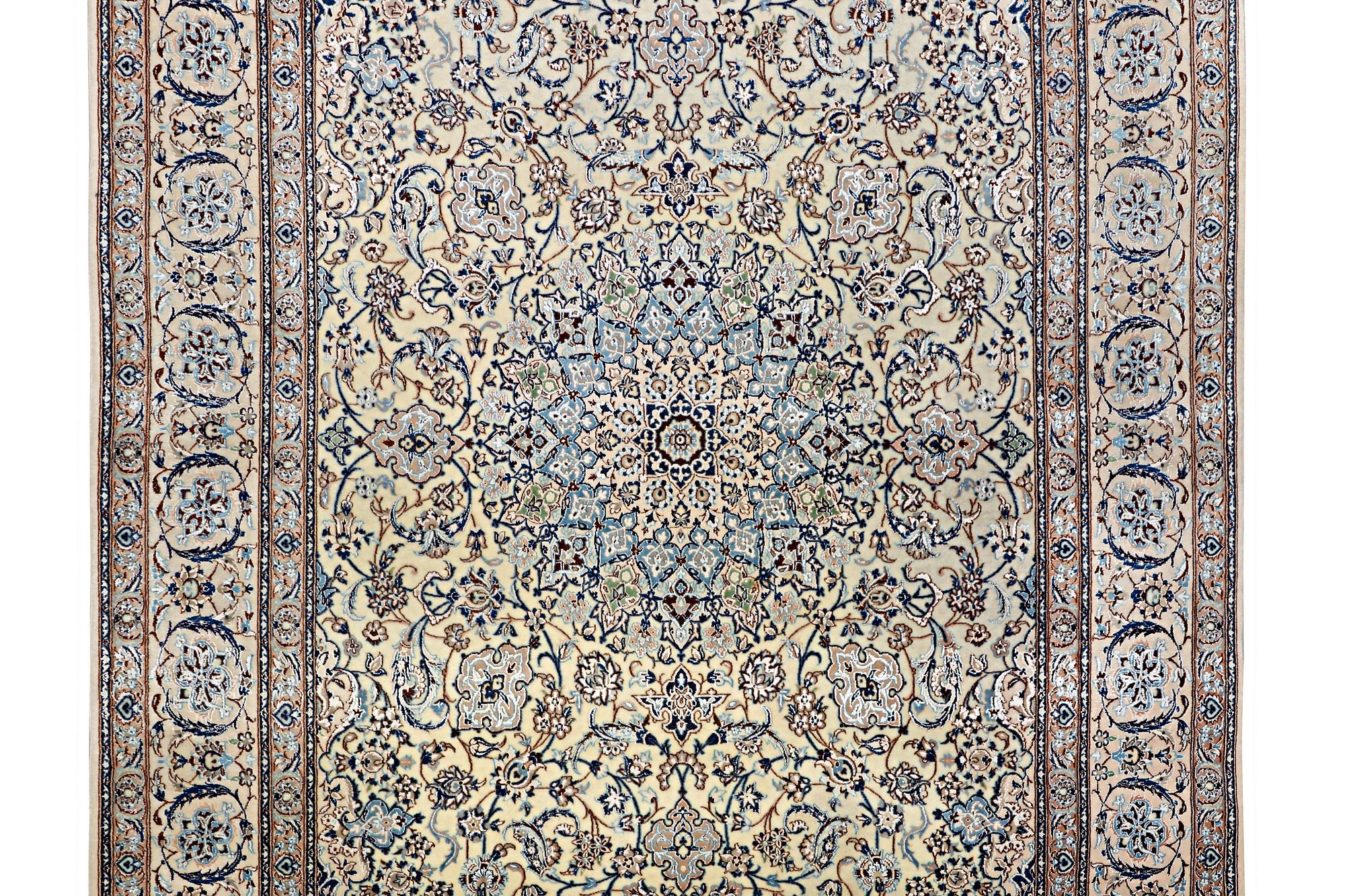 A Nain carpet, part silk, 6 laa, c. 283 x 180 cm.