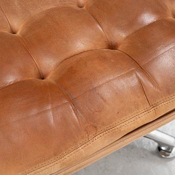Kenneth Bergenblad, a pair of leather upholstered 'Herkules' armchairs from Dux.
