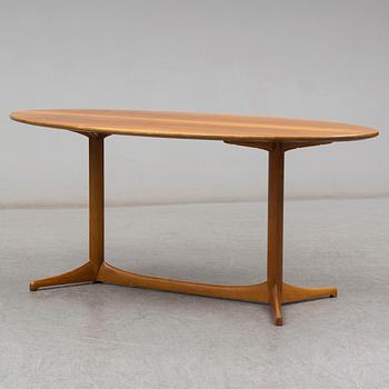 A 1959 'Plommonet' walnut coffee table by Kerstin Hörlin-Holmquist for Nordiska Kompaniet.