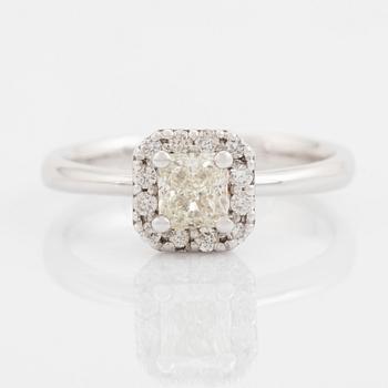 Radiant cut diamond and brilliant cut diamond ring.