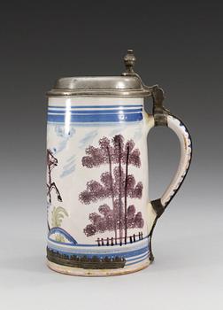 A pewter mounted faience tankard, 1780's, presumably Bayreuth.