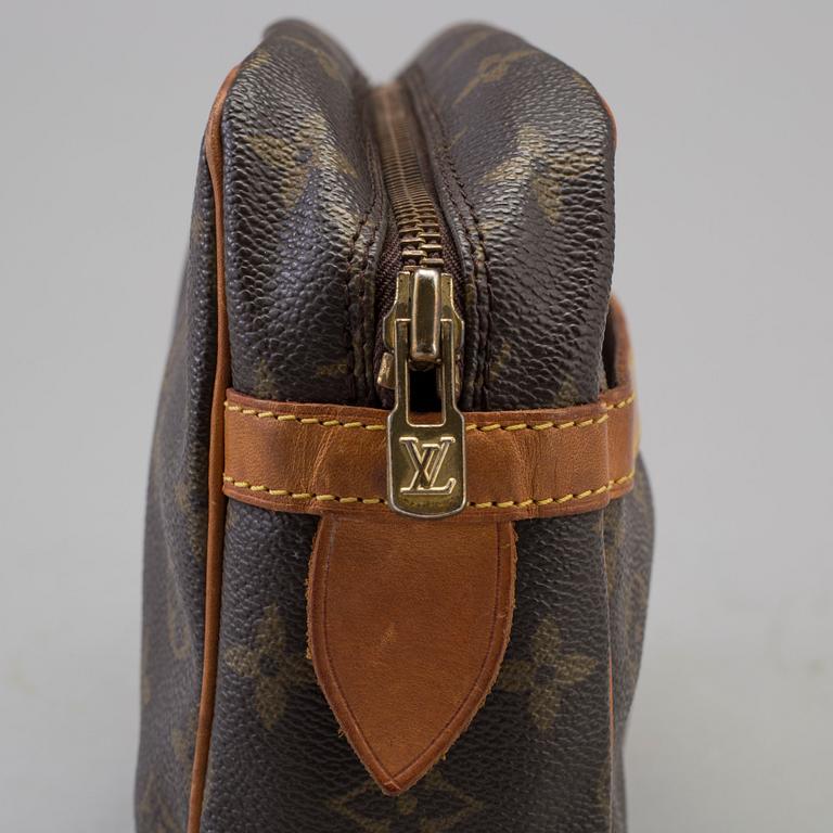 a LOUIS VUITTON toilet bag.