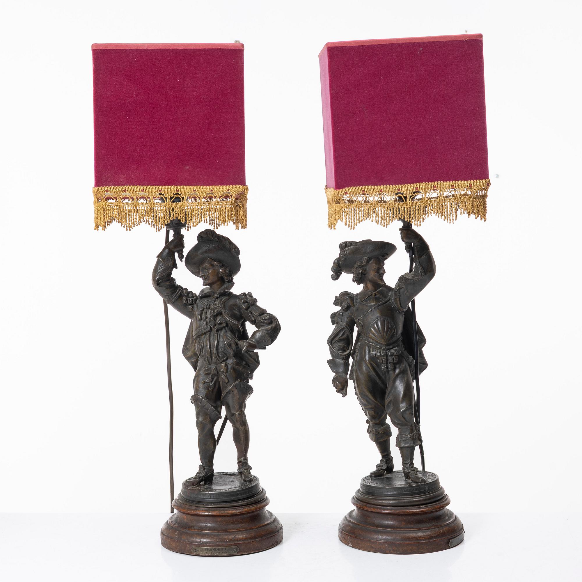 Auguste Poitevin, after, a pair of "Frondeur" sculptures/tablelamps, France, early 20th century.