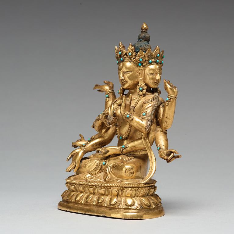 USNISHAVIJAYA, förgylld kopparlegering. Tibetokinesisk, sent 1700-tal/omkring 1800.