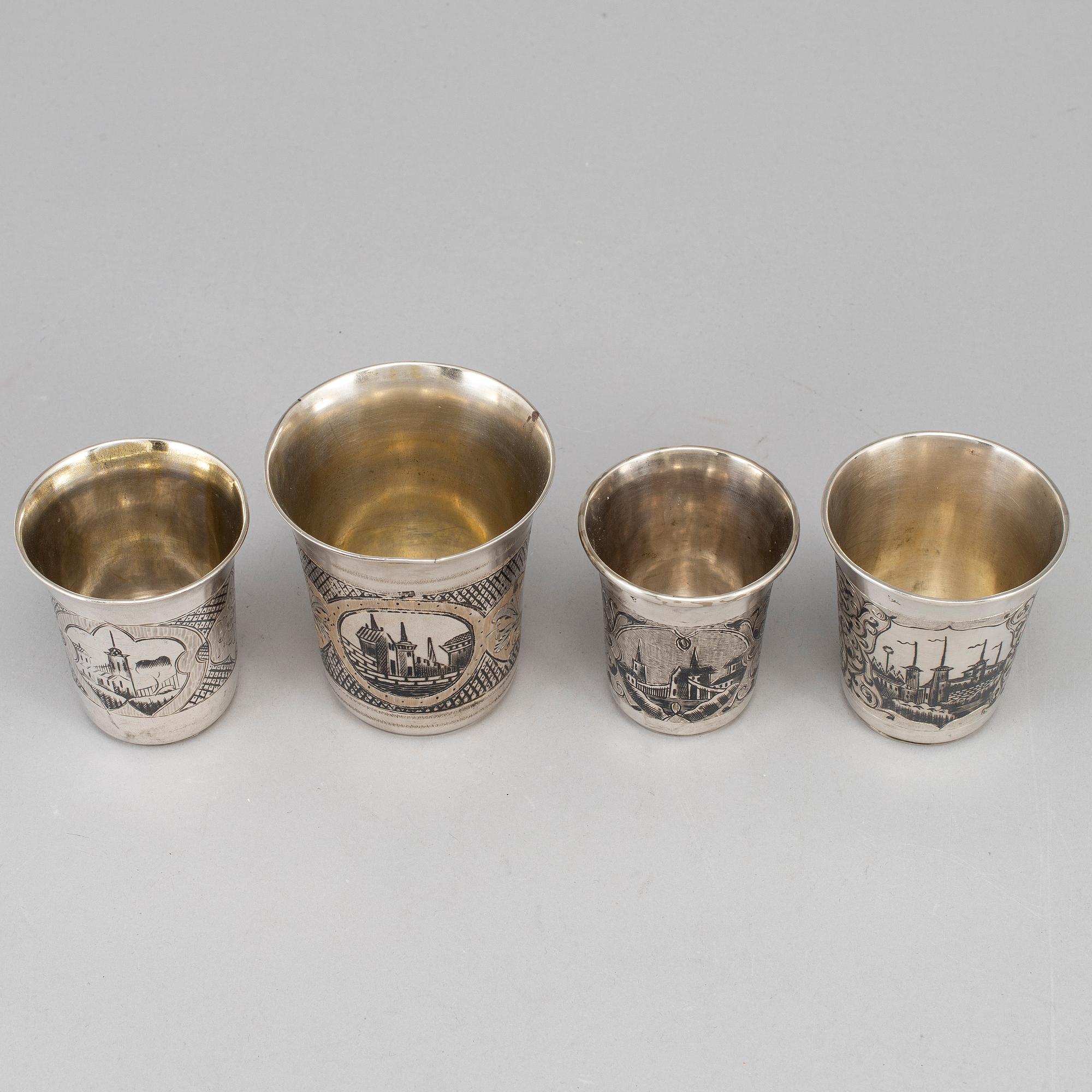 A set of four Russian 19th century silver and niello vodka cups, Moscow.