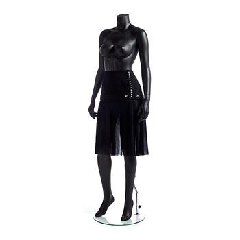 BALENCIAGA, a black wool blend and silk skirt.