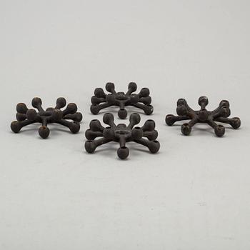 JENS QUISTGAARD, four cast iron candlesticks from Dansk Designs, Denmark, 1960's.