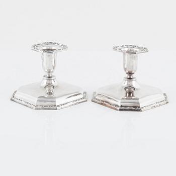 A Swedish Silver Ladle, mark of Adolf Öström, Piteå 1887 and a pair of Silver Candlesticks.