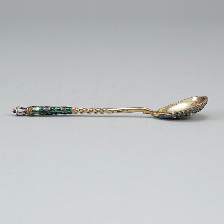 A Russian 20th century silver-gilt and enamled tea-spoon, unidentified makers mark, Moscow 1908-1917.