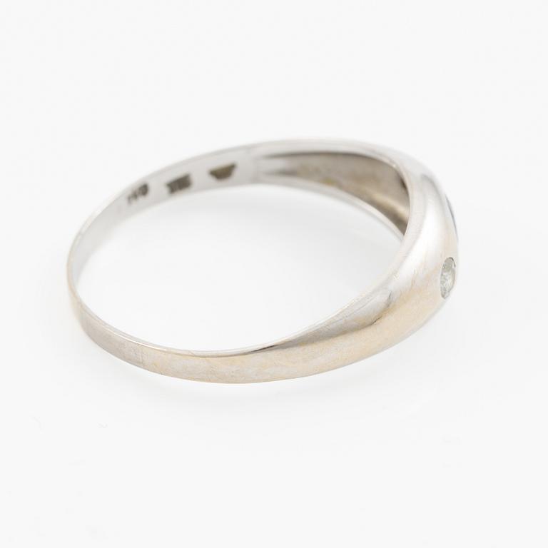 Ring, 18K white gold with sapphire and brilliant-cut diamonds.