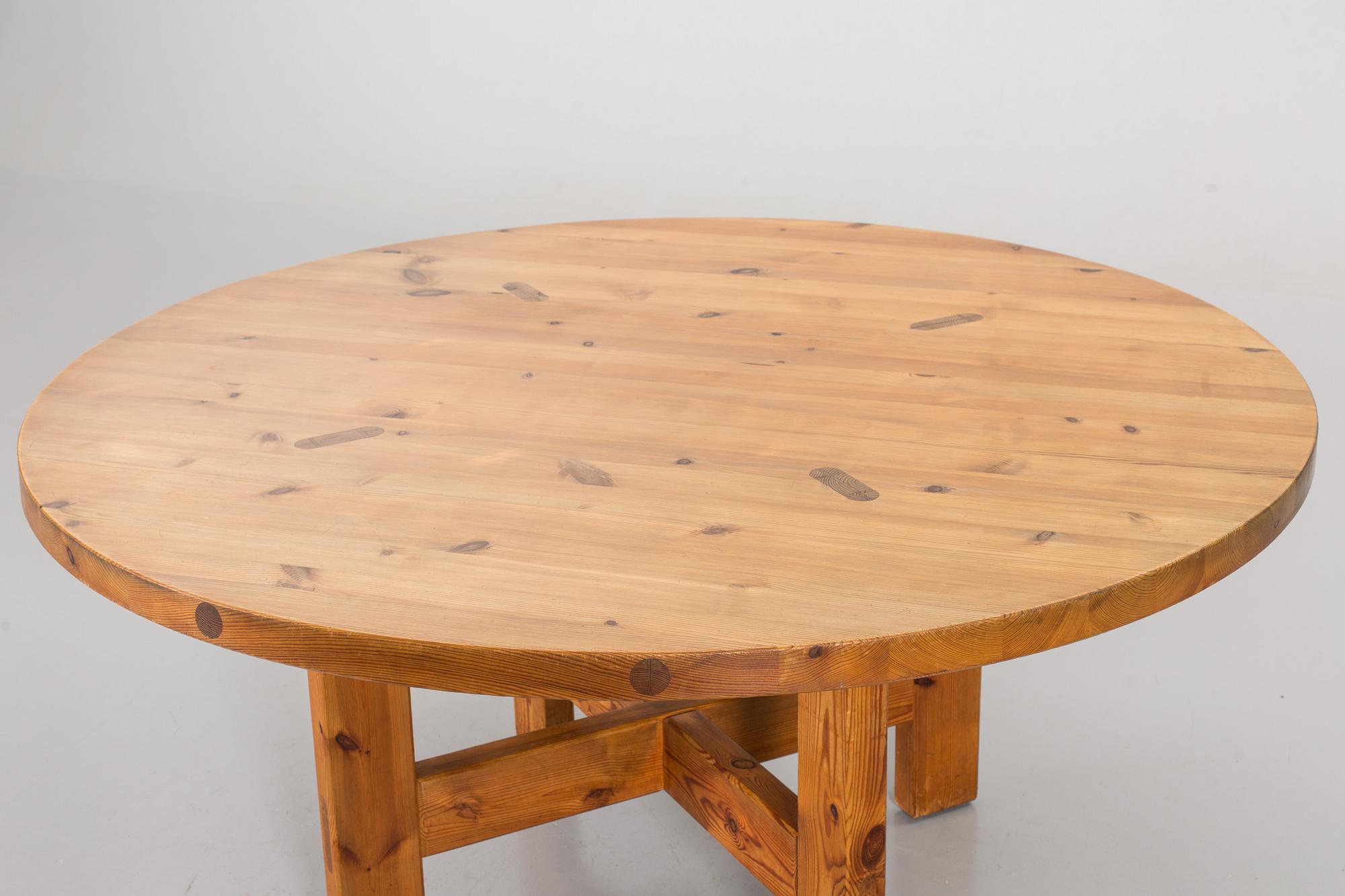 A Swedish 1960's pine tree Roland Wilhelmsson dining table for Karl Andersson.
