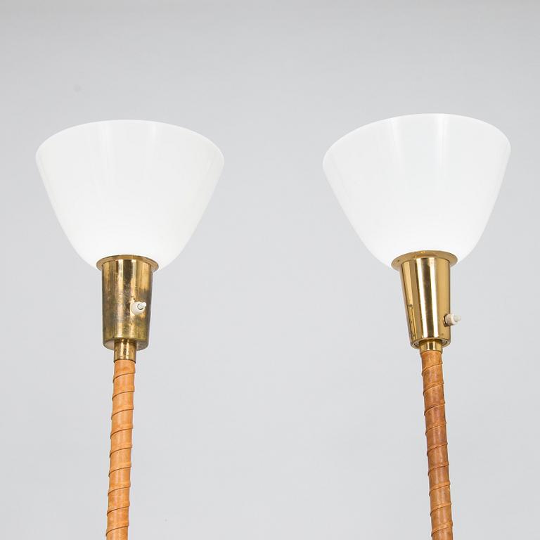 Lisa Johansson-Pape, Two mid-20th-century floor lamps for Stockmann Orno.