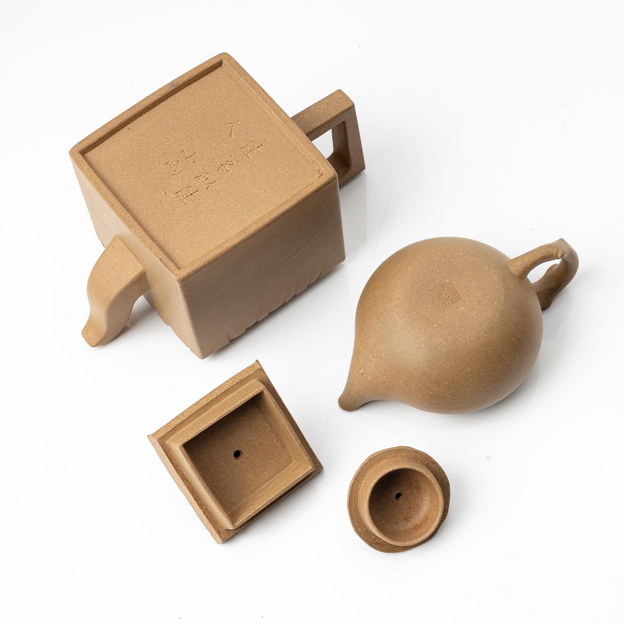 Two yellow yixing teapots, China, 1980/90s.